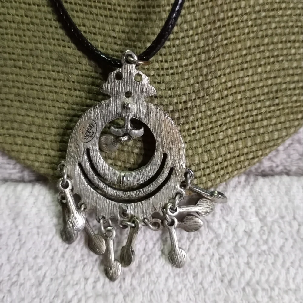 Silvertone crystal Premier designs pendant on black cord
